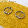 Annular brooches for leg wraps (winnigas)